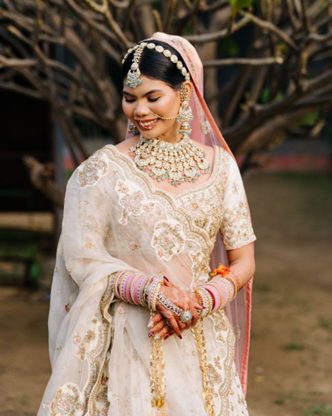 Nooraniya Off-White Zardozi Bridal Lehenga with Two Dupattas - view 2